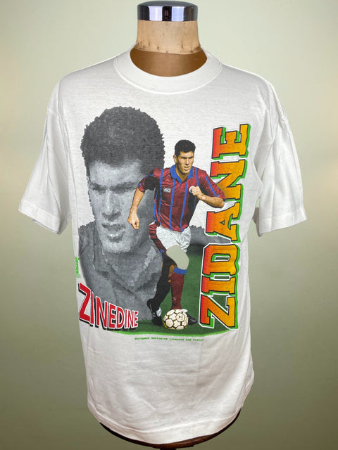 White t-shirt with Zinedine Zidane graphic on a mannequin against a plain background