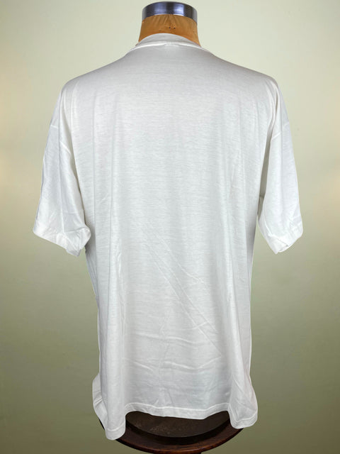 White t-shirt on a mannequin against a plain background