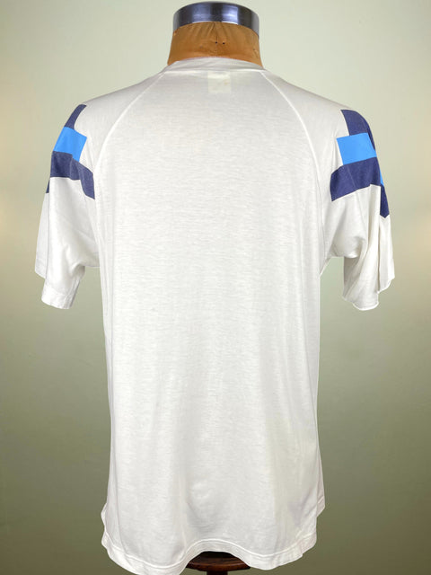 White Argentina T-Shirt with blue and navy accents on a mannequin against a neutral background