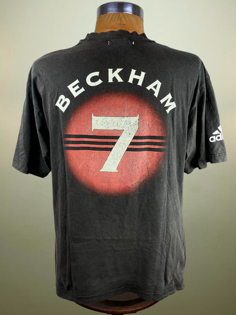 Black t-shirt with 'Beckham 7' design on a mannequin against a plain background