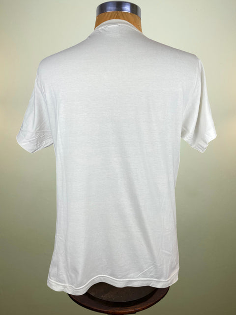 White t-shirt on a mannequin against a plain background