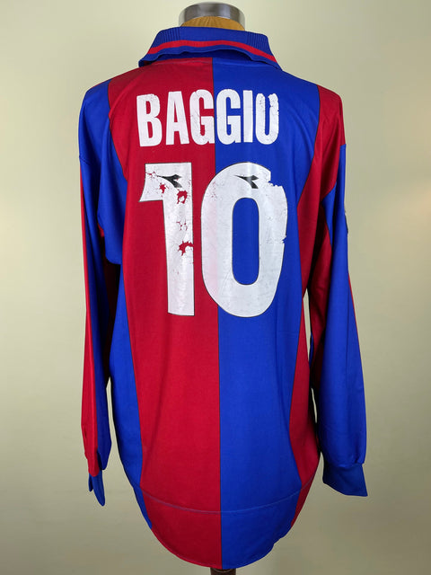Red and blue Bologna 1997-98 jersey with 'BAGGIO' and number '10' on a beige background