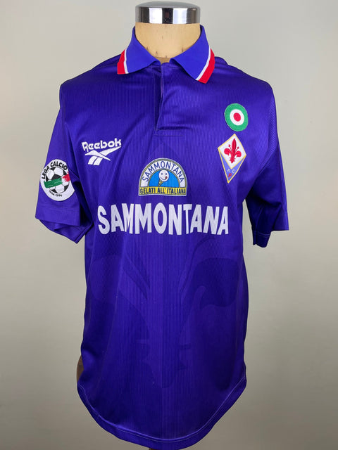 Fiorentina 1996-97 purple short sleeved home shirt with coppa italia badge on the chest and Smmontana sponsor, made by Reebok