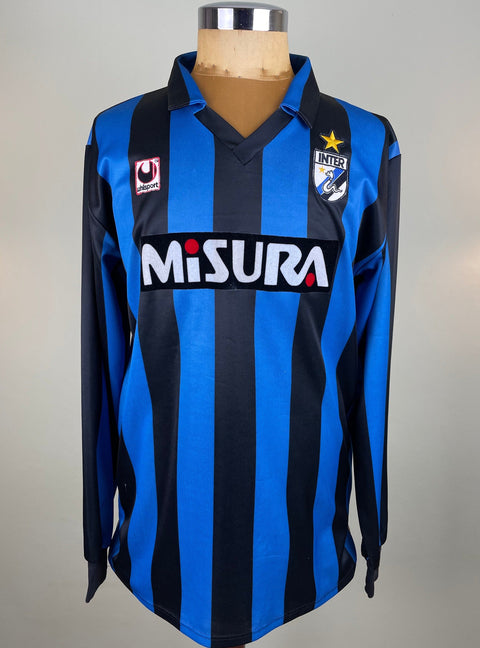 A black and blue striped match worn Inter Milan 1988-89 home jersey featuring the Inter Milan club crest and the name 'Misura' on the front.