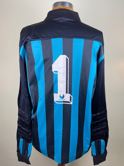 A match worn long-sleeved Stefano Tacconi Juventus goalkeeper jersey, signed, with blue and white stripes, featuring the number 1 on the back.