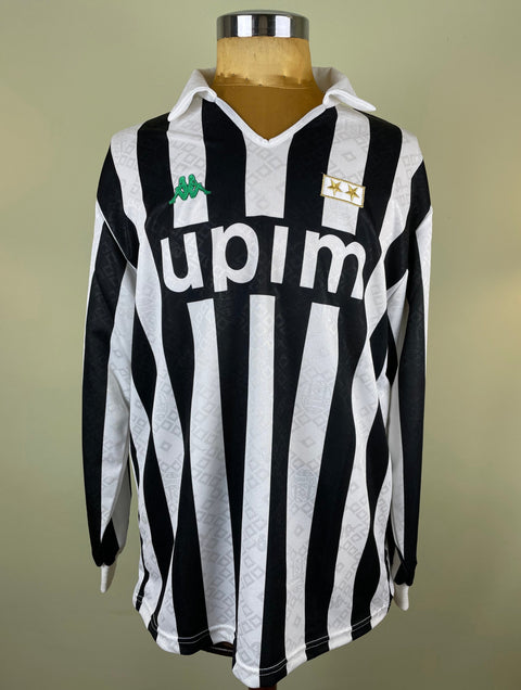 A black and white striped match worn Antonio Conte Juventus soccer jersey featuring long sleeves and a V-neck collar.