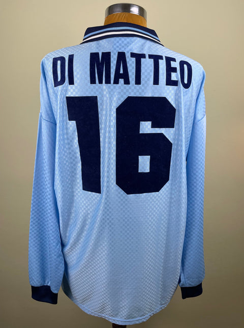 Match worn blue long sleeve Lazio home shirt from the 1995-96 season worn by Roberto Di Matteo with name and number 16 black flock across the back of the shirt. Made by Umbro.