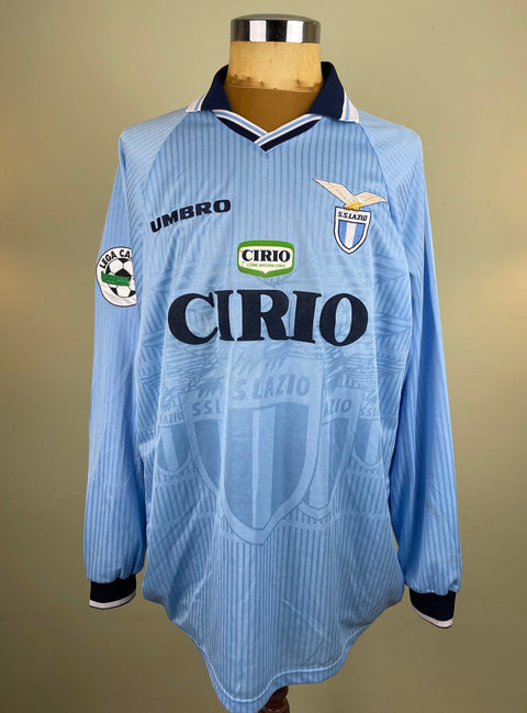 Match worn light blue long sleeve Lazio home shirt from the 1997-98 season worn by Pierluigi Casiraghi with Cirio Sponsor in black flock across the front of the shirt. Made by Umbro.