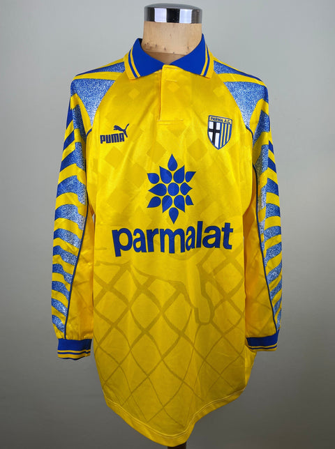 Match worn yellow Hristo Stoichkov long sleeve Parma away shirt from the 1995-96 season, with Parmalat sponsor across the chest in the fabric of the shirt. Made by Puma.