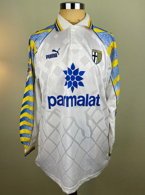 Match worn white Enrico Chiesa  Parma long sleeve home shirt from the 1996-97 season, with Parmalat sponsor across the chest in the fabric of the shirt. Made by Puma.