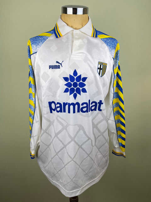 Match worn white Alberto Di Chiara Parma long sleeve home shirt from the 1996-97 season, with Parmalat sponsor across the chest in the fabric of the shirt. Made by Puma.