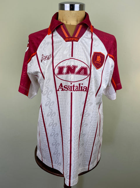 White AS Roma 1996/97 away shirt, short sleeves, INA Assitalia sponsor across the chest. Match-worn by Francesco Totti. Asics logo.